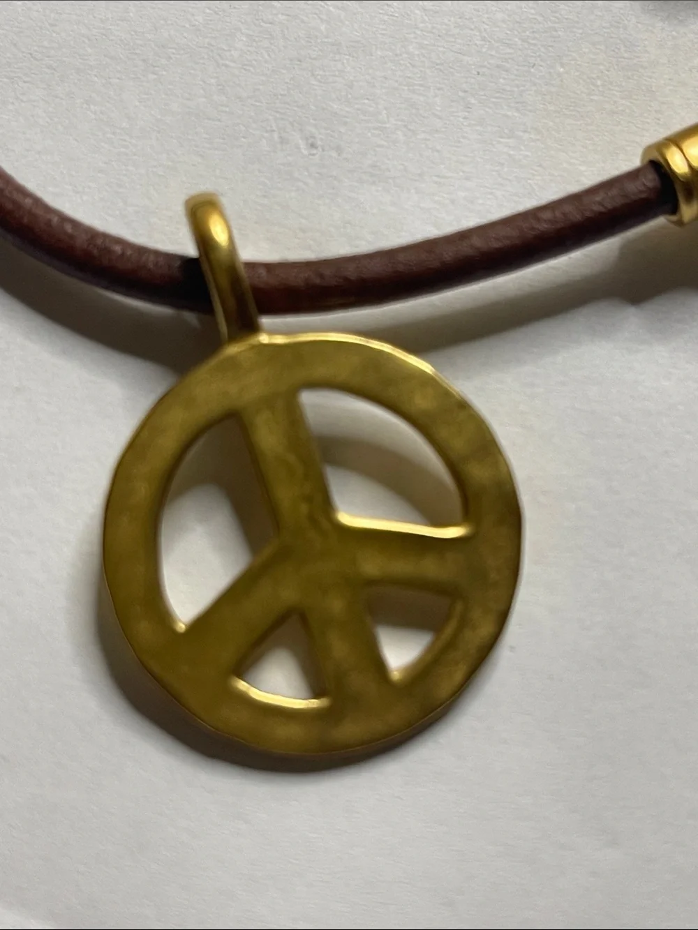 Coach Brown Leather Bracelet with Gold Peace Charm
